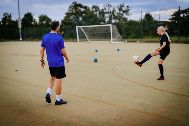 A Foot-Tech coach observing a training exercise