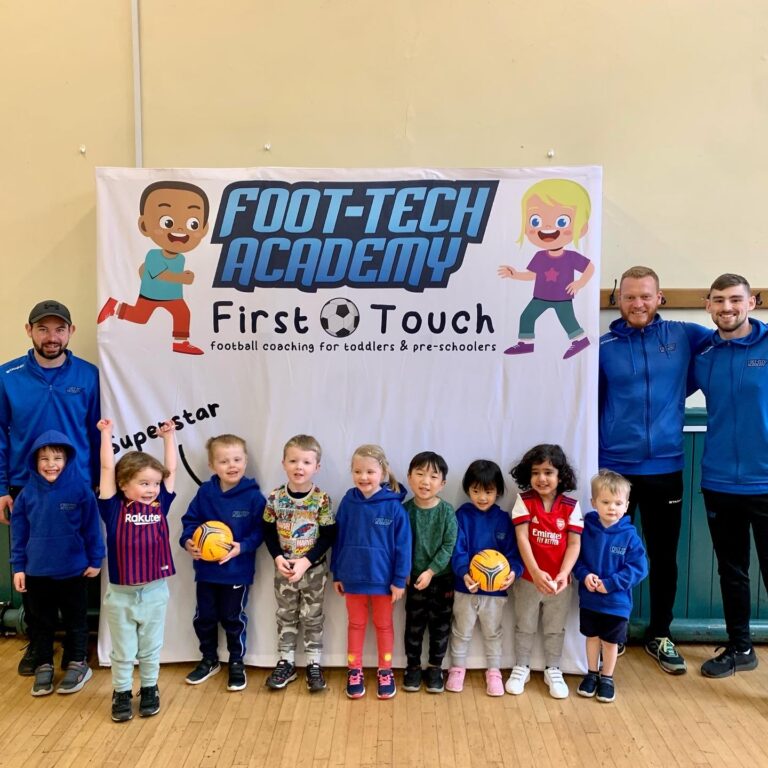 Toddlers at a Foot-Tech First Touch session with their coaches